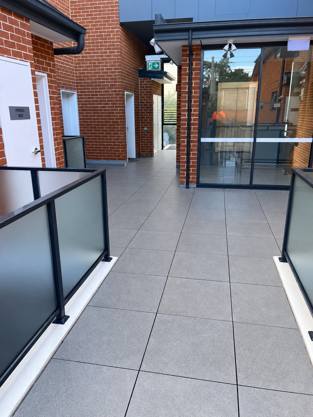 Clean dry tiled floor in a building common area